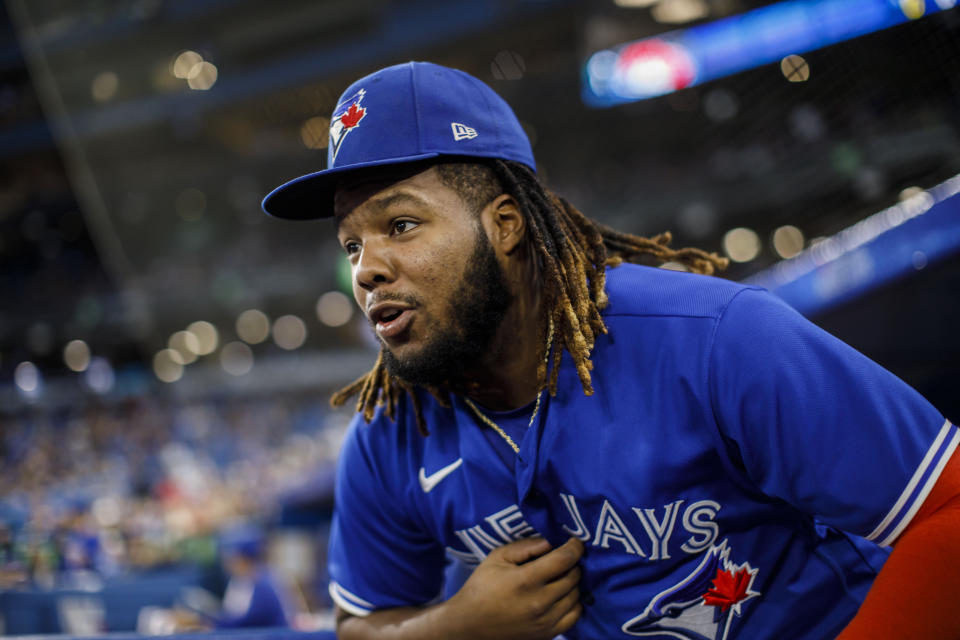 Toronto Blue Jays first baseman Vladimir Guerrero Jr. takes the field before a baseball game against the Boston Red Sox in Toronto, Sunday, Oct. 2, 2022. (Cole Burston/The Canadian Press via AP)