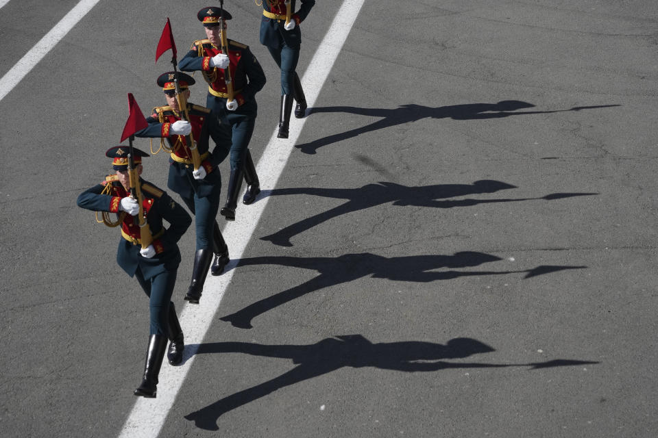 Honour guard soldiers march during the Victory Day military parade at Dvortsovaya (Palace) Square to celebrate 78 years after the victory in World War II in St. Petersburg, Russia, Tuesday, May 9, 2023. (AP Photo/Dmitri Lovetsky)