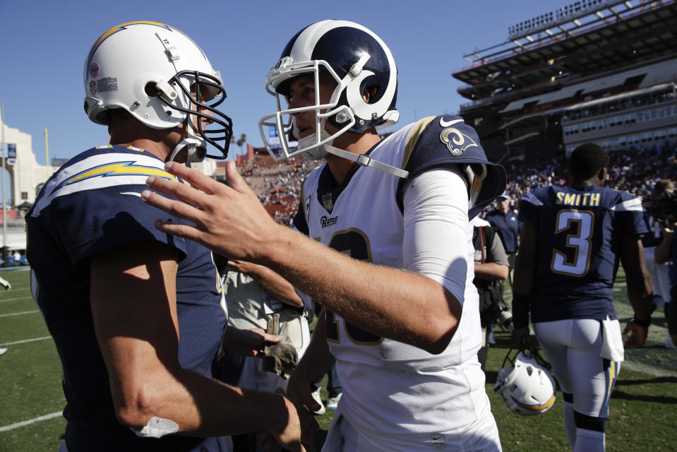 Los Angeles Rams quarterback Jared Goff greets Los Angeles Chargers quarterback Philip Rivers, left, after a game earlier this season. (AP)