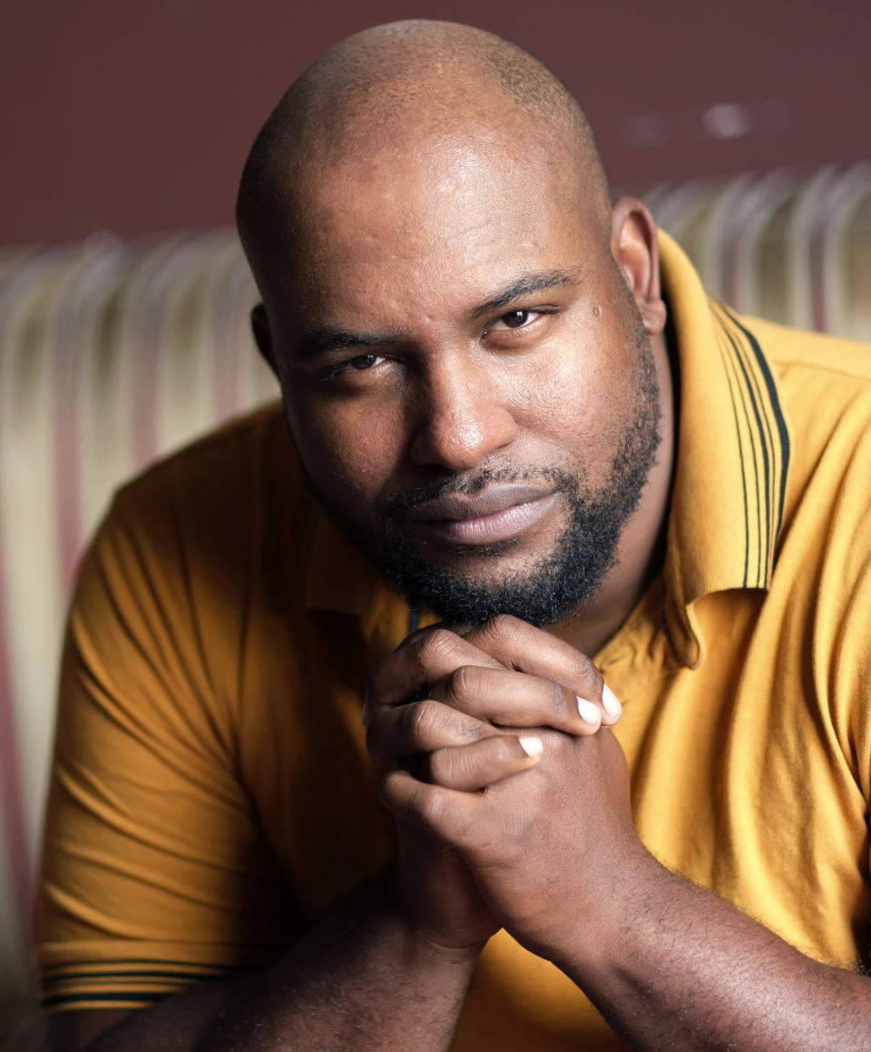 Author LaDarrion Williams poses for a portrait in Los Angeles on Thursday, April 25, 2024, to promote his book "Blood at the Root." (AP Photo/Chris Pizzello)