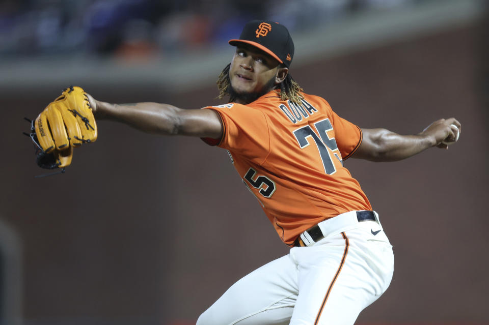 San Francisco Giants relief pitcher Camilo Doval throws to a Los Angeles Dodgers batter during the ninth inning of a baseball game in San Francisco, Friday, June 10, 2022. (AP Photo/Jed Jacobsohn)