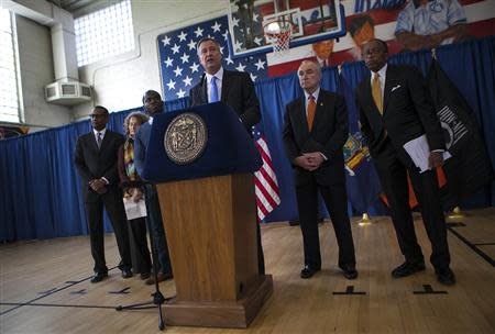 New York Mayor Bill de Blasio speaks at a news conference in the Brownsville neighborhood in the borough of Brooklyn, New York January 30, 2014. REUTERS/Eric Thayer