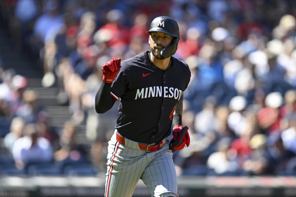 Minnesota Twins’ Carlos Correa celebrates drawing a walk during the first inning of a baseball game against the Cleveland Guardians, Thursday, Sept. 19, 2024, in Cleveland. (AP Photo/Nick Cammett)