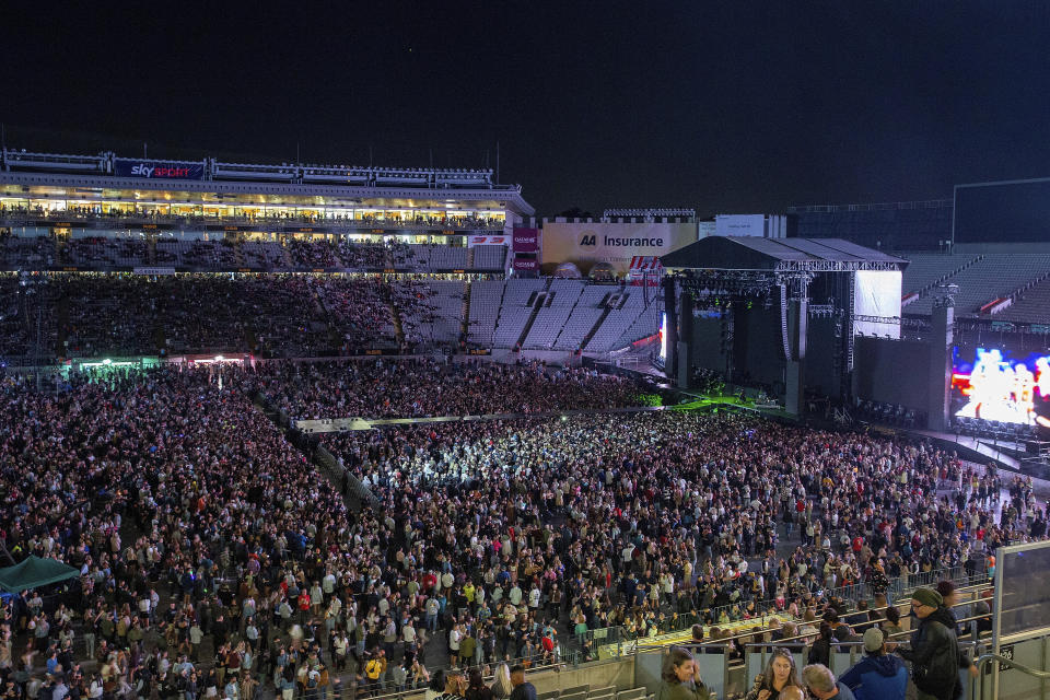 Fans fill the stadium as New Zealand band Six60 perform at Eden Park in Auckland, New Zealand, Saturday, April 24, 2021. Six60 is being billed as the biggest live act in the world since the coronavirus pandemic struck after New Zealand stamped out the spread of the virus, allowing life to return to normal. On Saturday, the band played a remarkable finale to their latest tour, performing in front of 50,000 people at the first-ever concert at Auckland's Eden Park. (AP Photo/David Rowland)