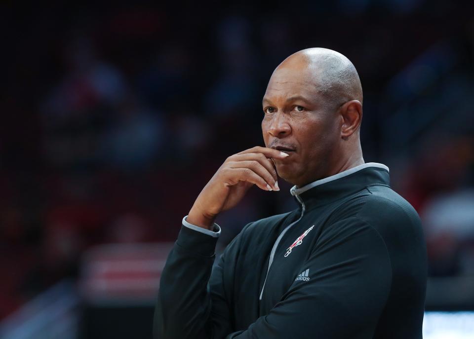 U of L head coach Kenny Payne watched his team in action against Simmons College during their game at the Yum Center in Louisville, Ky. on Oct. 18, 2023.