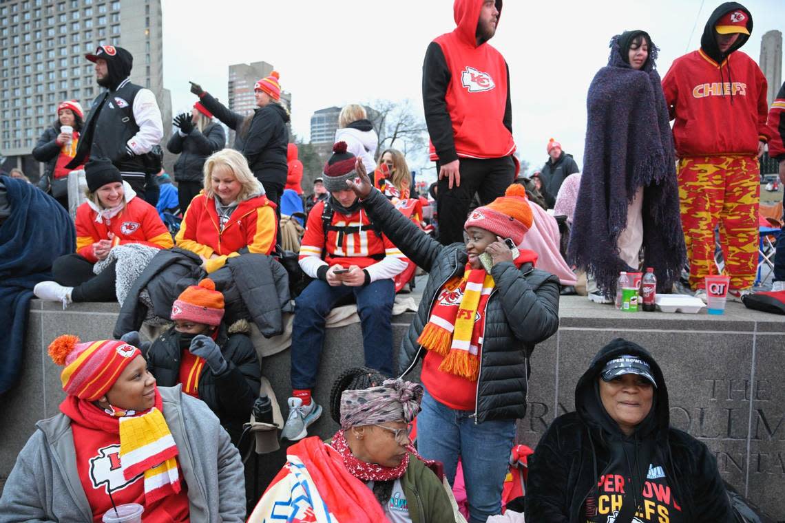 Chiefs fans Nesha Narcisse, from left front row, Jontue Little, La-Toya Sheppard, Canisha Little wait to see the Chiefs Super Bowl parade at the fountain in front of Union Station Wednesday. Some of the fans said they arrived to get their spots at 4:30 a.m.