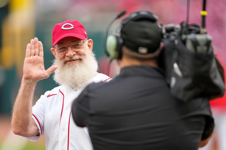 Academy Award-winning actor J.K. Simmons delivers the lineup before the first inning of the MLB National League game between the Cincinnati Reds and the Chicago Cubs at Great American Ball Park in downtown Cincinnati on Tuesday, April 4, 2023. The Reds led the Cubs after six innings.