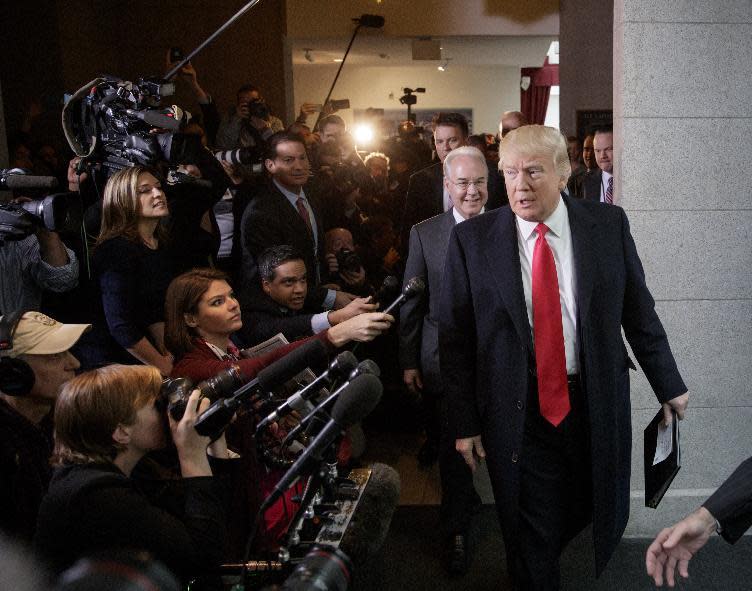 President Donald Trump and Health and Human Services Secretary Tom Price on Capitol Hill in Washington, Tuesday, March 21, 2017, to rally support for the Republican health care overhaul by taking his case directly to GOP lawmakers. (AP Photo/J. Scott Applewhite)