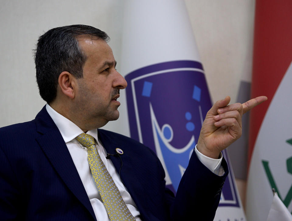 Judge Jaleel Adnan Khalaf, chairman of the Iraqi Independent High Electoral Commission, speaks during an interview with The Associated Press, Tuesday, Sept. 14, 2021, in Baghdad, Iraq. Iraq has identified and thwarted attempts of voter fraud less than one month before Iraq is set to hold federal polls including the selling of votes and intimidation using arms, the head of Iraq's electoral commission said. (AP Photo/Hadi Mizban)