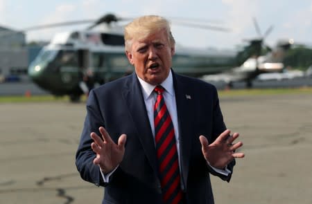 U.S. President Donald Trump speaks to reporters before boarding Air Force One to return to Washington from Morristown Municipal Airport in Morristown, New Jersey