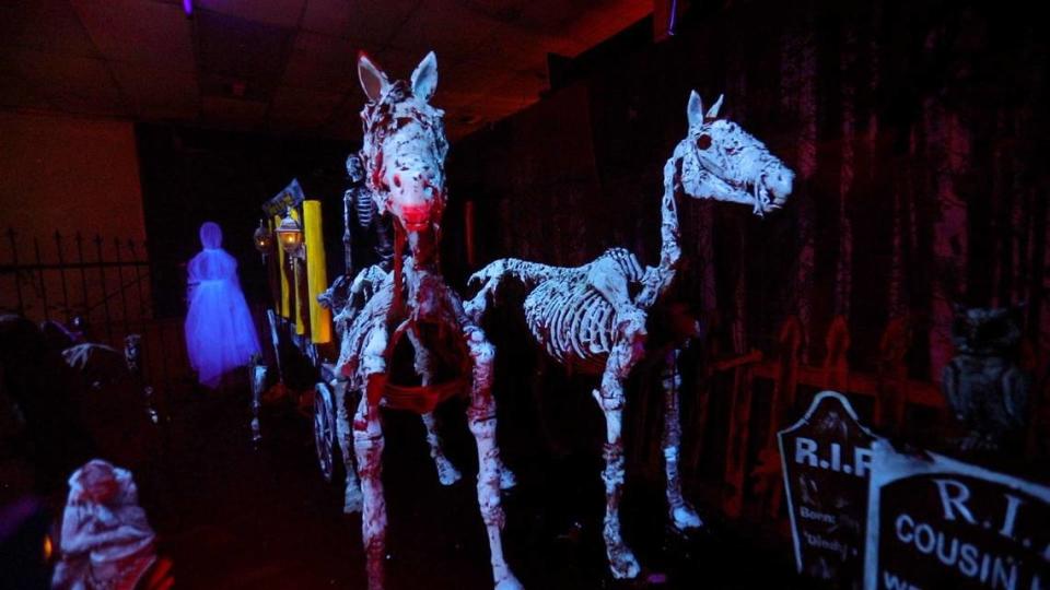 A ghostly carriage with two skeleton horses greets guests as they enter the Nightmare from Main Street in Paso Robles.