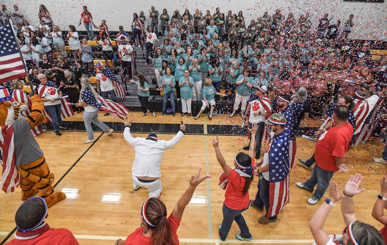 Mike McCoy, Special Education Teacher at Crescent High, leads a dance to James Brown's "Living in America" during an opening ceremony performance for the Anderson School District 3 teacher and staff school kickoff in the Crescent High School gymnasium in Iva, S.C. Friday, July 26, 2024.