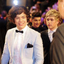 Harry impressed in a white suit in Australia in early 2012.