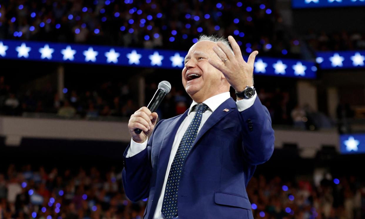 <span>Tim Walz speaks at a campaign rally at the Fiserv Forum in Milwaukee, Wisconsin, on 20 August 2024.</span><span>Photograph: Kamil Krzaczyński/AFP/Getty Images</span>