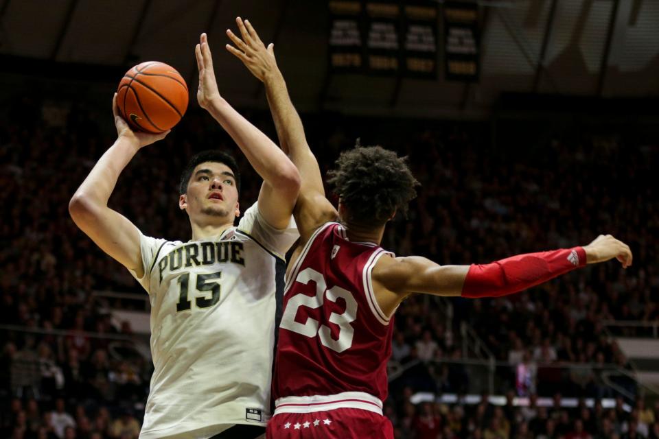 Purdue center Zach Edey (15) goes up for a shot against Indiana forward Trayce Jackson-Davis (23) during the second half of an NCAA men's basketball game, Saturday, March 5, 2022 at Mackey Arena in West Lafayette.