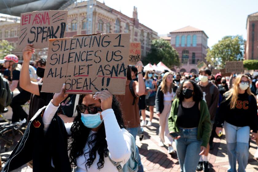 Los Angeles, California - April 18: USC students participate in a silent march in support of Asna Tabassum, whose graduation speech has been cancelled by USC administration at University of Southern California on Thursday, April 18, 2024 in Los Angeles, California. Asna Tabassum, a graduating senior at USC, was selected as valedictorian and offered a traditional slot to speak at the 2024 graduation. After on-and-off campus groups criticized the decision and the university said it received threats, it pulled her from the graduation speakers schedule.(Wally Skalij / Los Angeles Times)