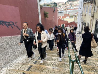 Jessica on Lisbon’s famed <strong><a href="https://legacy.travelnoire.com/explore-portugals-black-history-with-the-african-lisbon-tour/" rel="nofollow noopener" target="_blank" data-ylk="slk:African history walking tours.;elm:context_link;itc:0;sec:content-canvas" class="link ">African history walking tours.</a></strong> Credit: @africanlisbontour