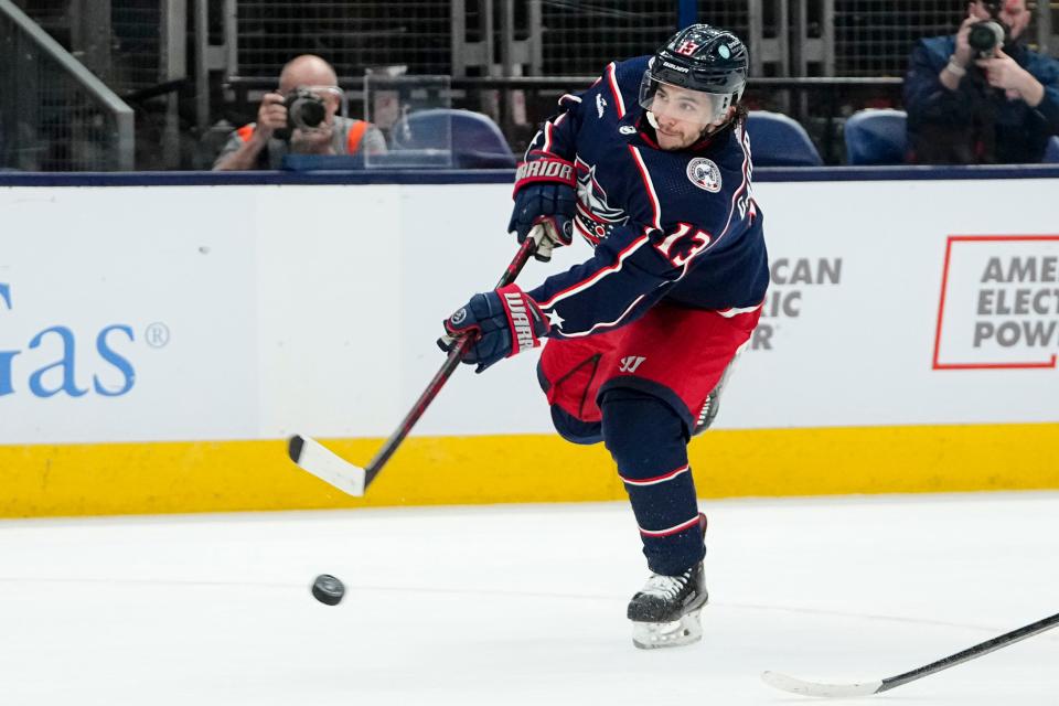 Oct 16, 2023; Columbus, Ohio, USA; Columbus Blue Jackets left wing Johnny Gaudreau (13) shoots during the third period of the NHL hockey game against the Detroit Red Wings at Nationwide Arena. The Blue Jackets lost 4-0.