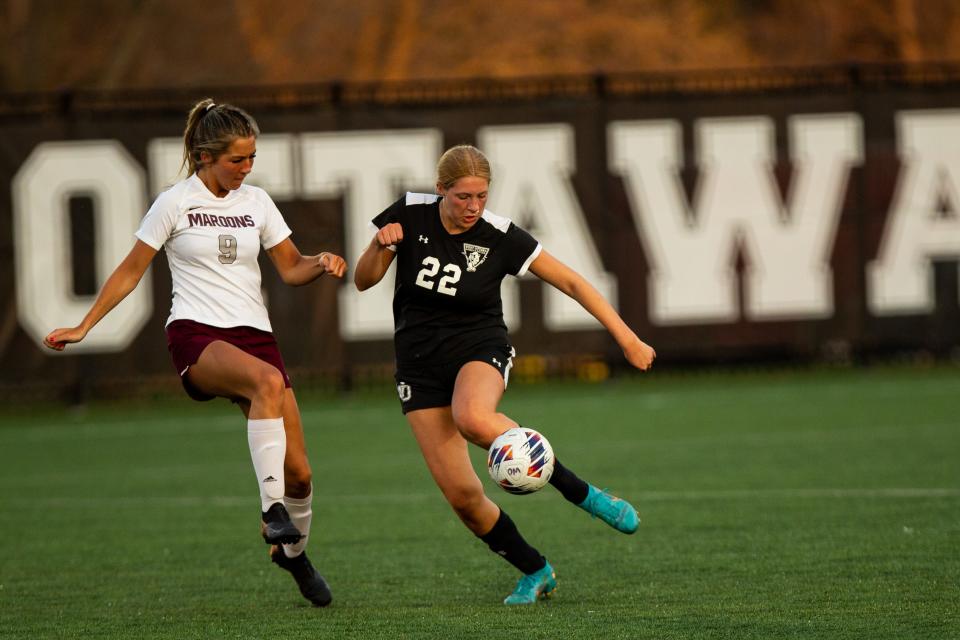 West Ottawa's Brooke Pedersen takes the ball around the Holland Christian defense Friday, April 14, 2023, at West Ottawa High School. 