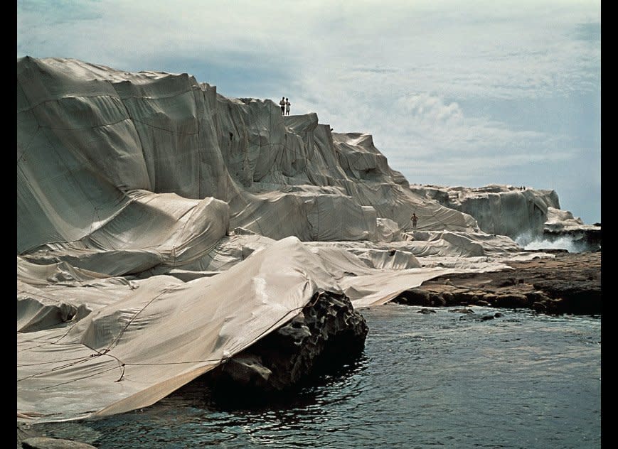 Harry Shunk  Caption: Christo and Jeanne-Claude  "Wrapped Coast, Little Bay, Sydney, Australia, 1968-69"  92,900 sq.m. (1,000,000 sq.ft.) of erosion control fabric, 56 km (35 mi.) of rope