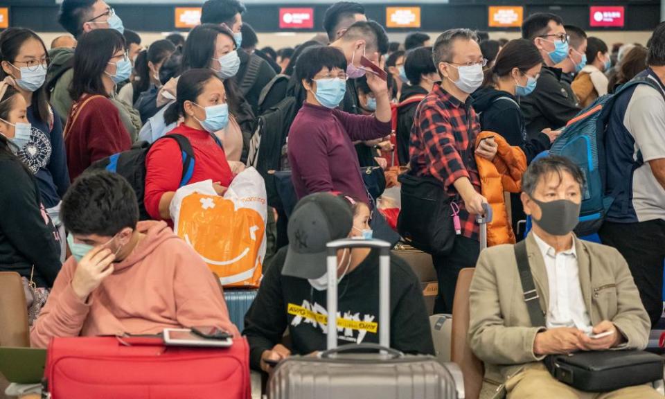 Travellers at the departure hall of West Kowloon Station on 23 January in Hong Kong, China.