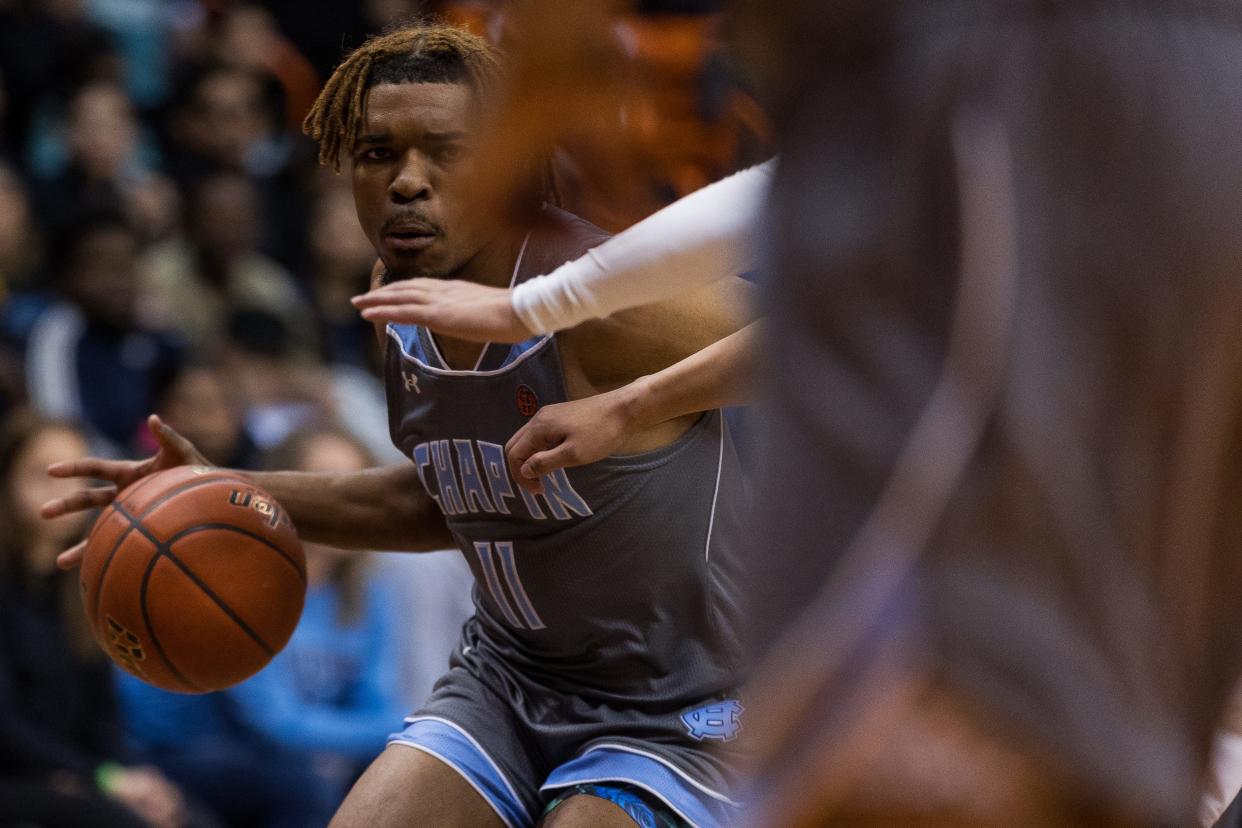 Chapin's Bryson Goldsmith (11) dribbles the ball at the Class 5A regional quarterfinal basketball game against Parkland on Tuesday, Feb. 28, at the Don Haskins Center.