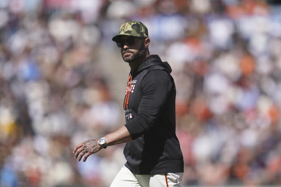 San Francisco Giants manager Gabe Kapler walks to the dugout after making a pitching change during the ninth inning of a baseball game against the San Diego Padres in San Francisco, Saturday, May 21, 2022. (AP Photo/Jeff Chiu)