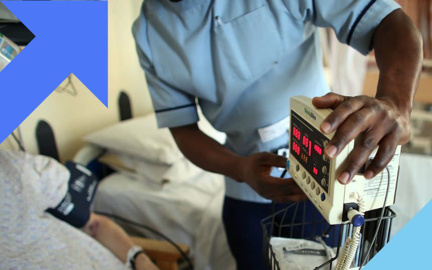 A nurse tends to a patient on a general ward - Christopher Furlong /Getty Images Europe