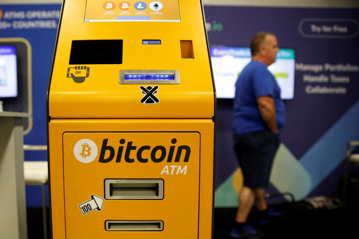 A bitcoin ATM is seen at a stand during the Bitcoin Conference 2022 in Miami Beach, Florida, U.S. April 6, 2022. REUTERS/Marco Bello