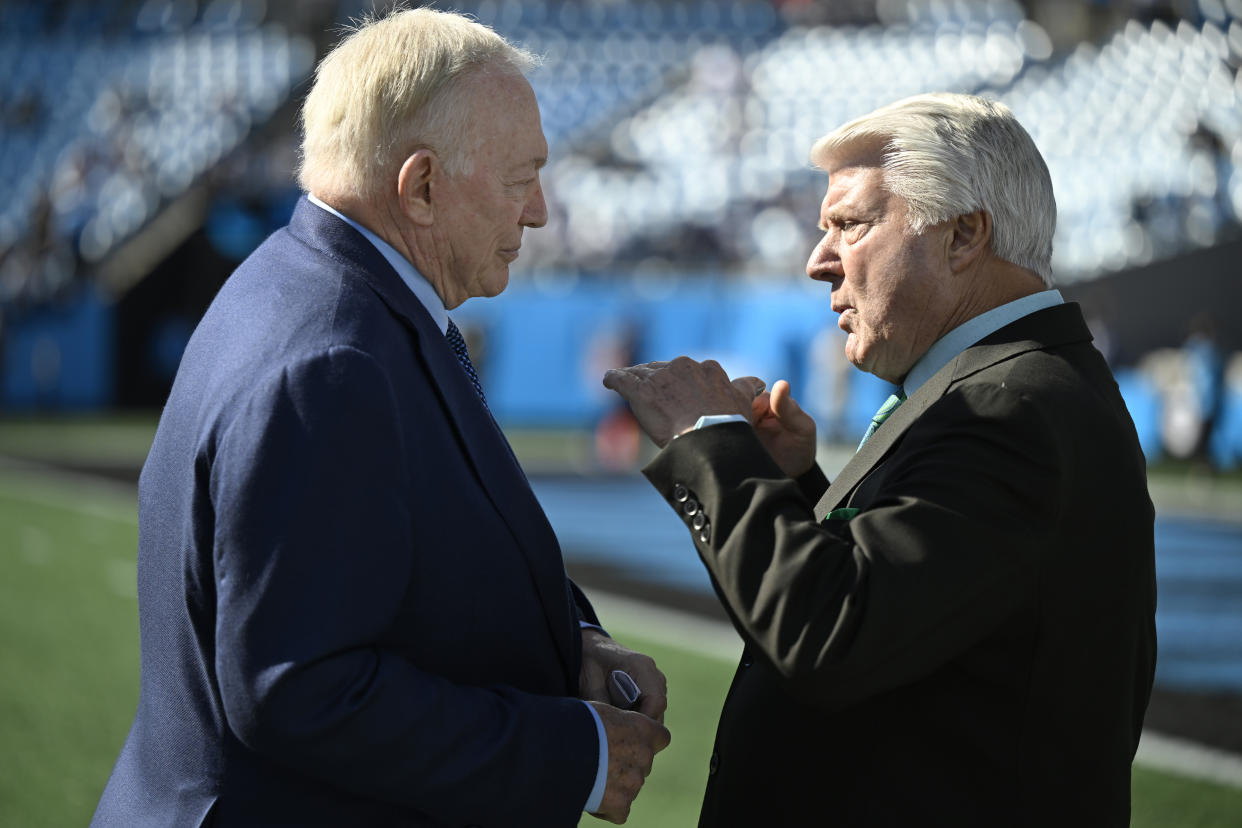 CHARLOTTE, NORTH CAROLINA - NOVEMBER 19: Dallas Cowboys owner Jerry Jones speaks with Jimmy Johnson before the game against the Carolina Panthers at Bank of America Stadium on November 19, 2023 in Charlotte, North Carolina. (Photo by Eakin Howard/Getty Images)