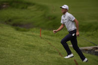 Will Zalatoris walks to the green on the eighth hole during the final round of the PGA Championship golf tournament at Southern Hills Country Club, Sunday, May 22, 2022, in Tulsa, Okla. (AP Photo/Sue Ogrocki)