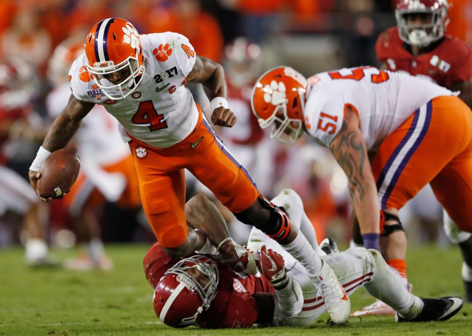 Clemson's Deshaun Watson is sacked by Alabama's Reuben Foster during the first half of the College Football Playoff championship game Monday, Jan. 9, 2017, in Tampa, Fla.