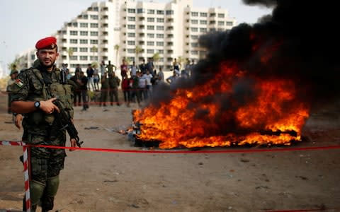 Hamas police burn drugs in Gaza - Credit: REUTERS/Mohammed Salem