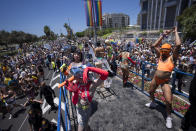 People participate in the annual Pride Parade, in Tel Aviv, Israel, Friday, June 10, 2022. (AP Photo/Oded Balilty)