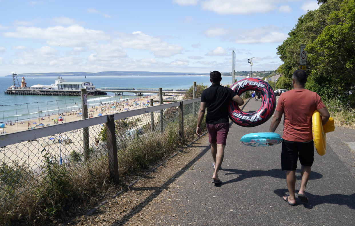 People make their way down towards Bournemouth Beach in Dorset. Picture date: Sunday June 23, 2024. (Photo by Andrew Matthews/PA Images via Getty Images)