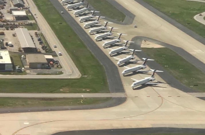 Delta planes are parked on an Atlanta airport runway: Twitter/@kimpaquette