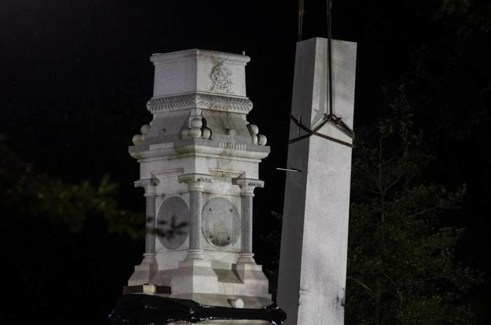 On the third day of attempts, a roughly 8,500 pound column of granite was lifted by a crane off the base where it stood for 125 years honoring the “bravery of the Southern soldier” in the Civil War, on Wednesday night, Jun. 23, 2020, in Raleigh, N.C. On the third day of attempts, a roughly 8,500 pound column of granite was lifted by a crane off the base where it stood for 125 years honoring the “bravery of the Southern soldier” in the Civil War, on Wednesday night, Jun. 23, 2020, in Raleigh, N.C.