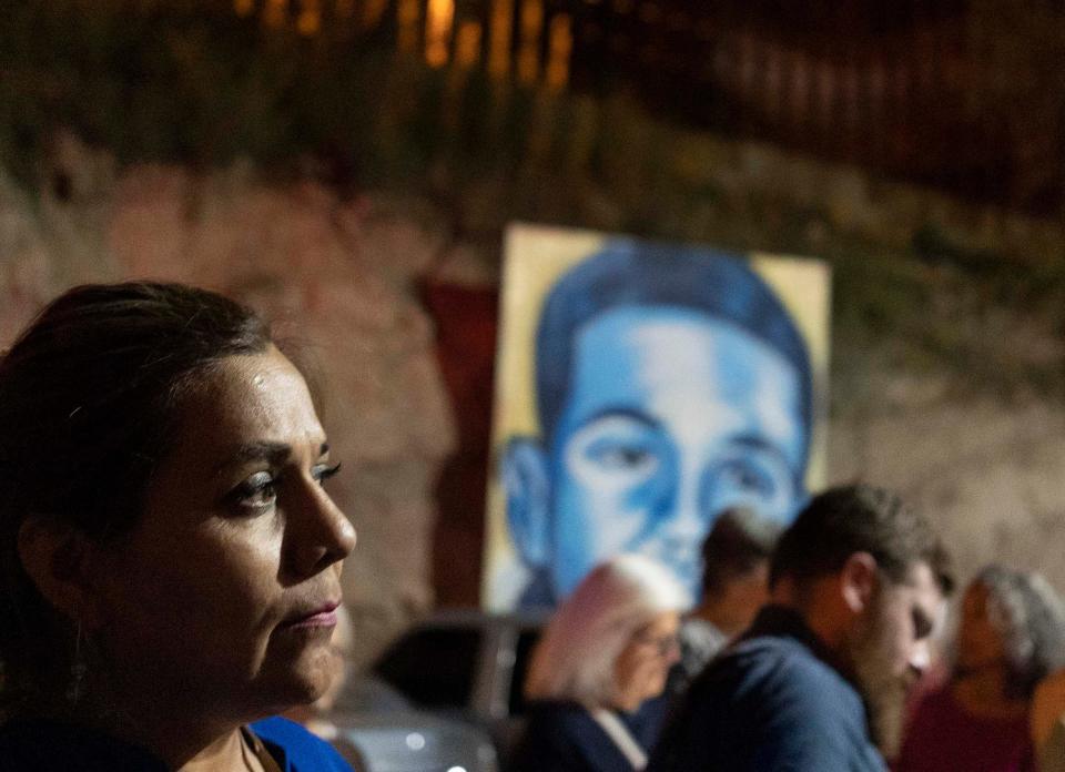 Araceli Rodríguez, mother of José Antonio Elena Rodríguez, gathers with family and friends on the seventh anniversary of the teen's fatal shooting through the U.S.-Mexico border fence by a Border Patrol agent in 2012.