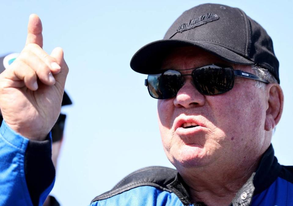 “Star Trek” actor William Shatner speaks on the landing pad of Blue Origin’s New Shepard near Van Horn, Texas, after flying into space on Oct. 13, 2021.