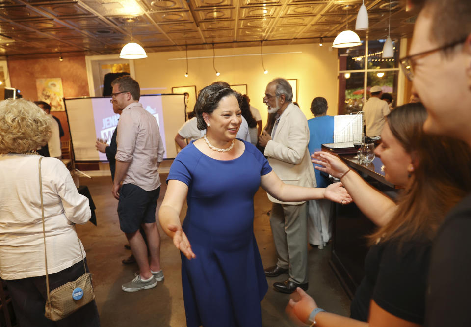 Jennifer McClellan, a candidate for Virginia Governor, greets supporters during Democratic Party primary election day in Richmond, Va., on Tuesday, June 8, 2021. (Daniel Sangjib Min/Richmond Times-Dispatch via AP)