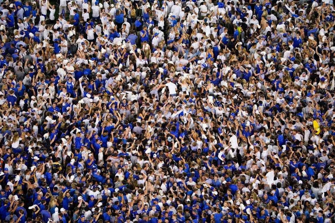 Fans rushed the field after Kentucky defeated Florida at Kroger Field on Oct. 2, 2021, in Lexington.