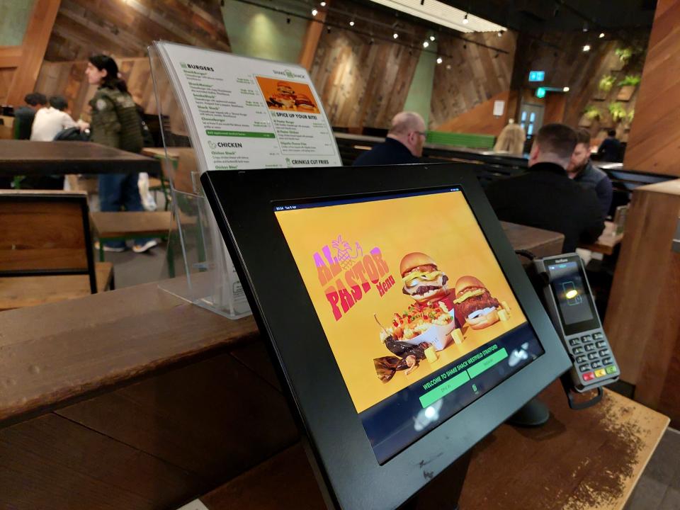The digital order kiosks in a Shake Shack restaurant in London
