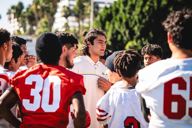 <p>Courtesy LA Rams</p> Rams Rookie Puka Nacua Visits Local High School Football Team Whose Coach is Fighting Cancer