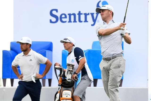 Justin Thomas follows through on a shot during the third round 