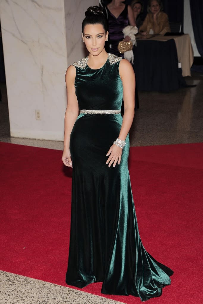 Kim Kardashian arrives at the White House Correspondents’ Association Dinner on April 28, 2012. - Credit: AP Photo/Kevin Wolf