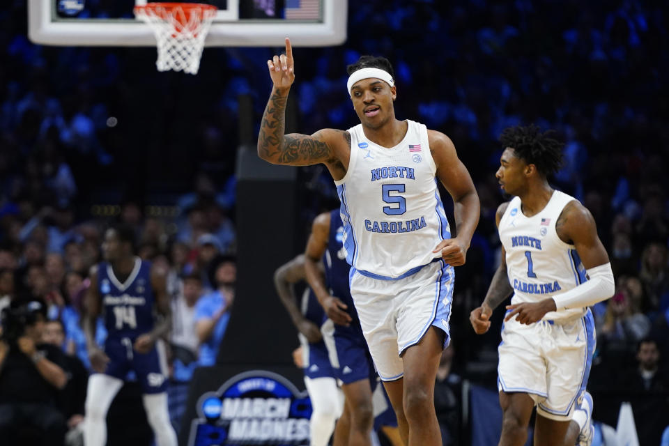 North Carolina's Armando Bacot reacts during the first half of a college basketball game against St. Peter's in the Elite 8 round of the NCAA tournament, Sunday, March 27, 2022, in Philadelphia. (AP Photo/Chris Szagola)