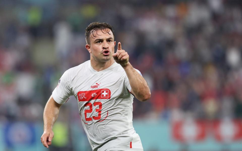 Xherdan Shaqiri #23 of Switzerland celebrates after scoring his team's first goal during the FIFA World Cup Qatar 2022 Group G match between Serbia and Switzerland - Wu Zhizhao/Getty Images