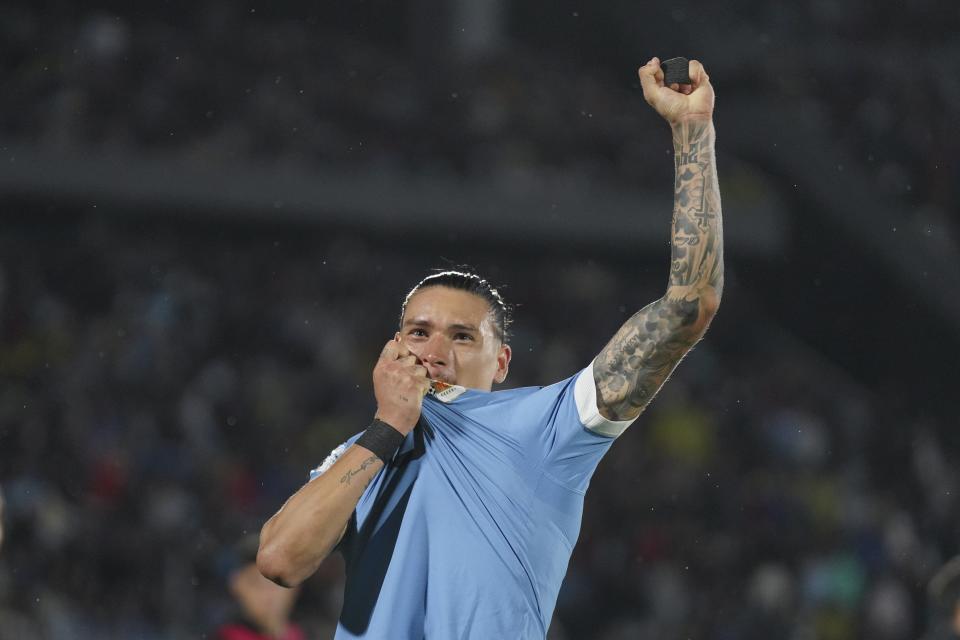 Uruguay's Darwin Nunez celebrates scoring his side's third goal against Bolivia during a qualifying soccer match for the FIFA World Cup 2026 at Centenario stadium in Montevideo, Uruguay, Tuesday, Nov. 21, 2023. (AP Photo/Matilde Campodonico)