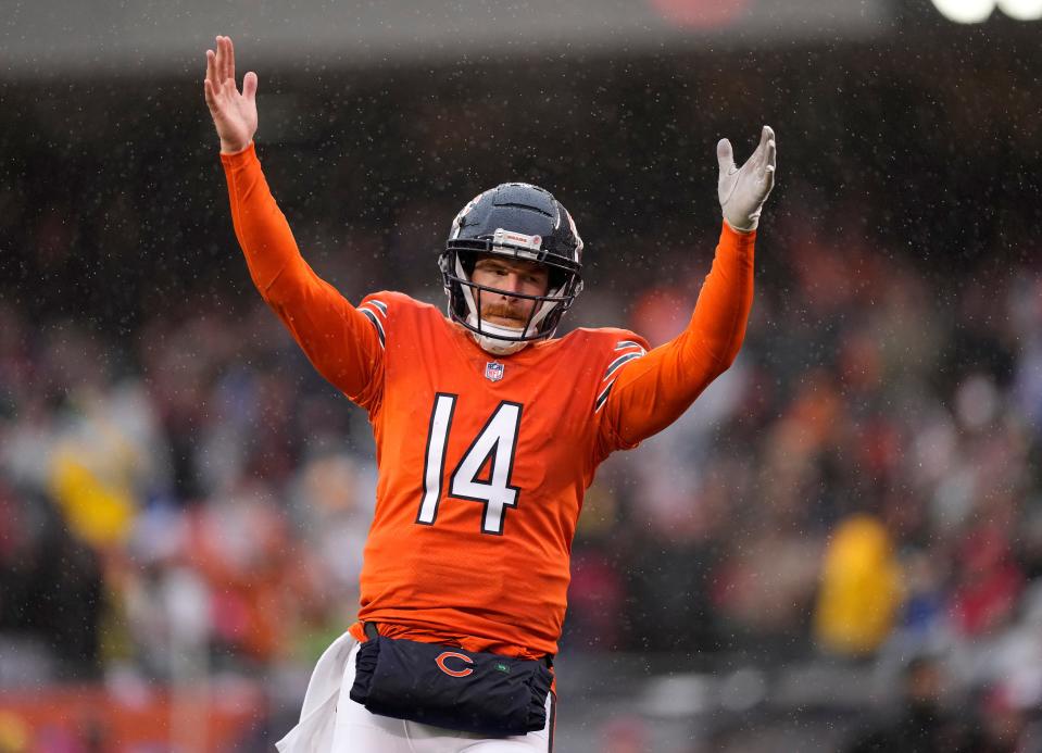 Dec 5, 2021; Chicago, Illinois, USA; Chicago Bears quarterback Andy Dalton (14) reacts after a touchdown against the Arizona Cardinals during the second quarter at Soldier Field. Mandatory Credit: Mike Dinovo-USA TODAY Sports