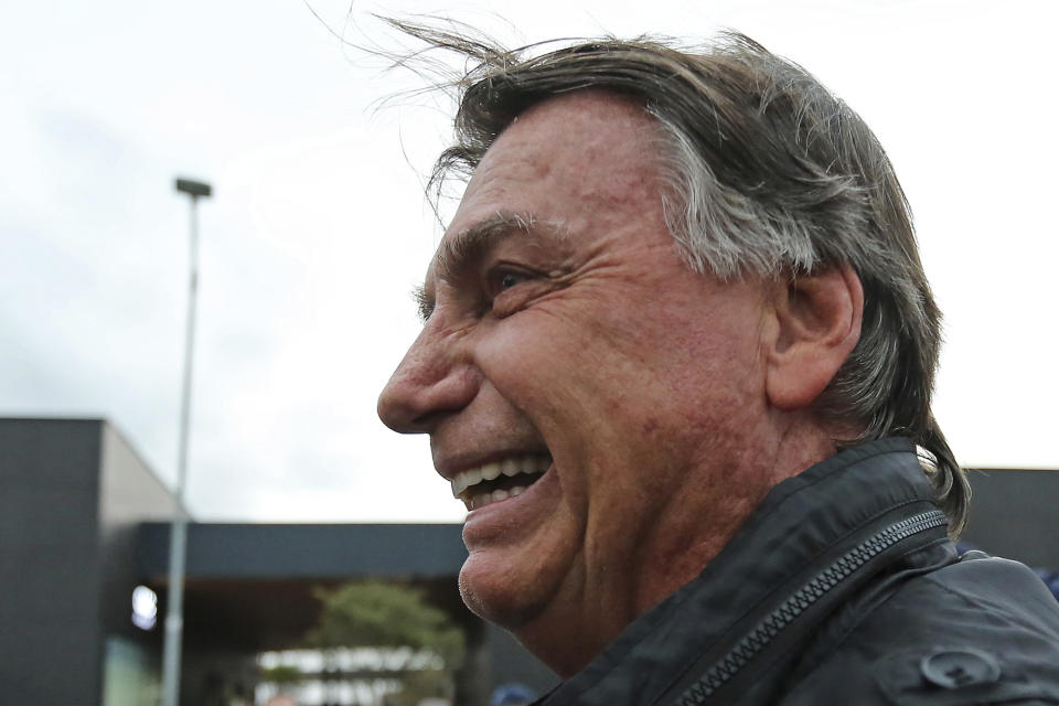 Brazilian former President Jair Bolsonaro deplanes at the international airport in Florianopolis, Santa Catarina state, Brazil, Friday, July 5, 2024. Brazilian police have indicted Bolsonaro for money laundering and criminal association in connection with undeclared diamonds the far-right leader received from Saudi Arabia during his time in office, according to a source with knowledge of the accusations. (AP Photo/Heuler Andrey)